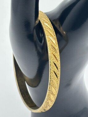 Vintage Monet Etched Textured and Shiny Gold-Tone Bangle Bracelet Signed 8-1/8"